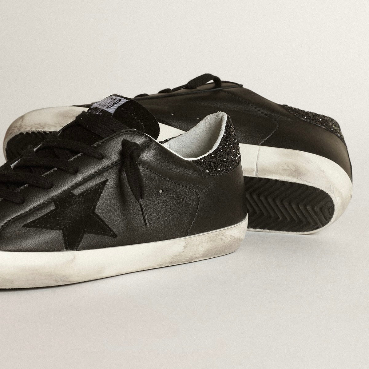 Golden Goose Super-Star in black nappa with black star and glitter heel tab(Women's)